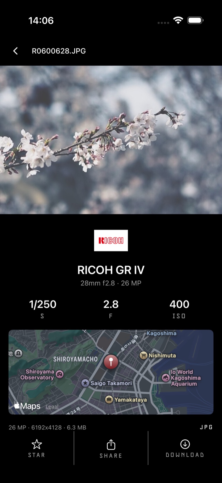 Air Snap photo detail view: a cherry-blossom photo above shutter speed, aperture and ISO readouts and a map of where it was taken